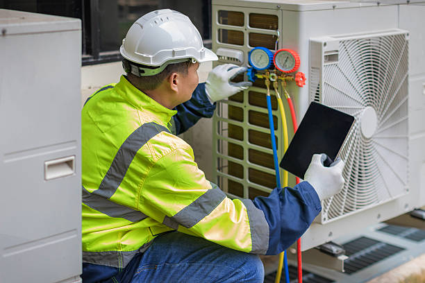 Professional Air Duct Cleaning technician working in Merced, CA